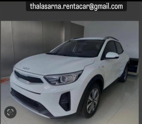a white car parked in a garage at Akrogiali in Kissamos