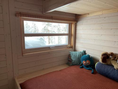 Ένα ή περισσότερα κρεβάτια σε δωμάτιο στο Sveheim - cabin with an amazing view