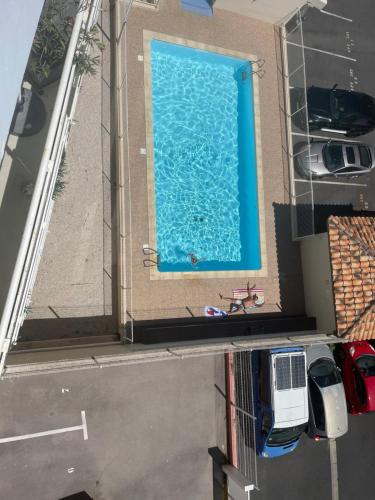 Appartement T2, climatisé, wifi, parking et piscine privés