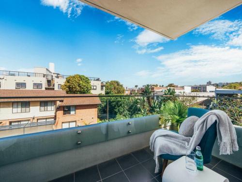 a balcony with a view of a city at XQ Collection Saltwater Bondi Beach in Sydney