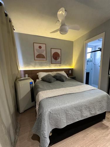 En eller flere senge i et værelse på Studio Paris prox Metro Bras Feirinha Madrugada Templo Salomão