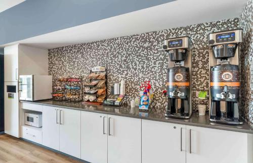 a kitchen with a counter with a coffee maker on it at Extended Stay America Premier Suites - Fredericksburg in Fredericksburg