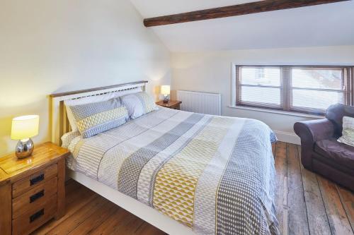 En eller flere senge i et værelse på Host & Stay - Sea Haven