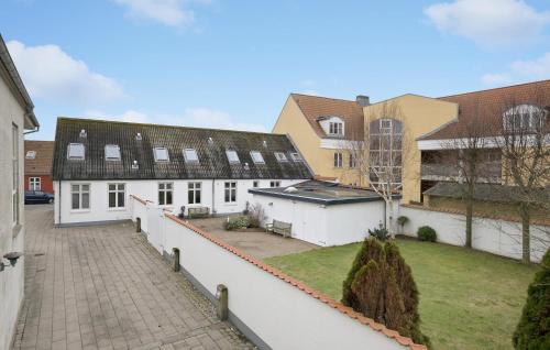 an aerial view of a building with a courtyard at Gorgeous Home In Løgstør in Løgstør