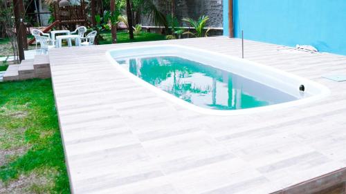 a swimming pool on top of a house at Pousada Costa Azul in Barra Grande