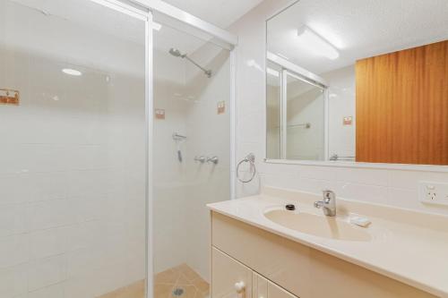 a bathroom with a sink and a shower at Unit 2 8 Banks Avenue in Tweed Heads