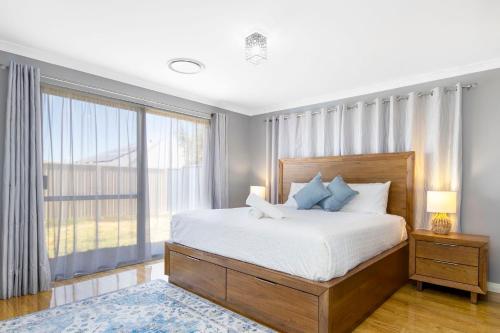 Ένα ή περισσότερα κρεβάτια σε δωμάτιο στο Killarney Retreat - Dunsborough