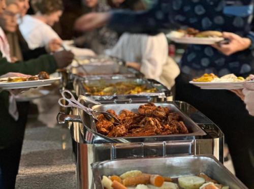 a buffet line with many different types of food at STAR of Wadi Rum in Wadi Rum