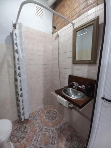 A bathroom at OLENA