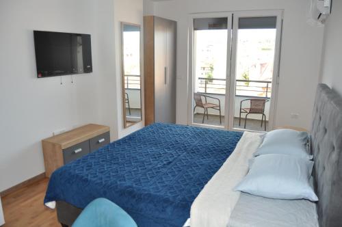 Un pat sau paturi într-o cameră la Studio Sophia