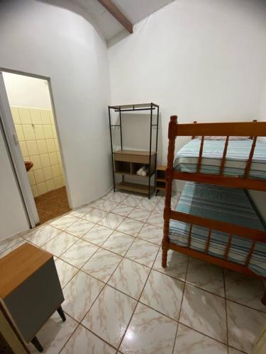 Katil atau katil-katil dalam bilik di Pousada Caminho do Ribeirão