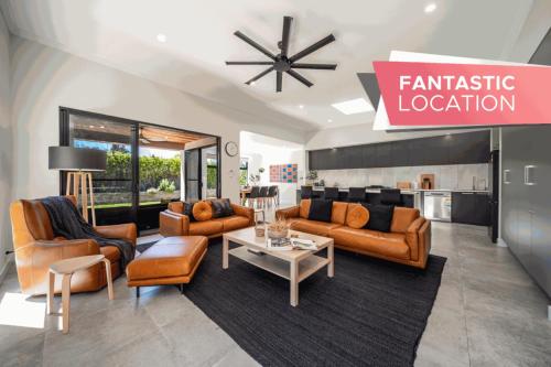 a large living room with couches and a table at Marble at South Plympton - 4BR Modern WiFi in South Plympton