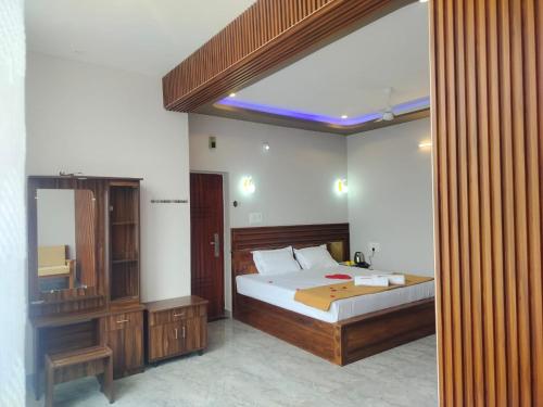 Sami Resort tesisinde bir odada yatak veya yataklar