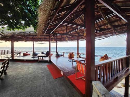 a resort with a view of the ocean at Tao Thong Villa 2 in Ko Tao
