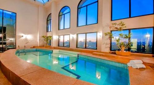 The swimming pool at or close to Hotel Clari-On Première Faria Lima - The Royal Deluxe - Duplex Studio Veranda - by LuXXoR