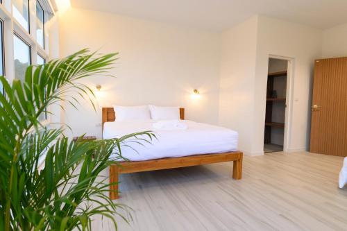 Cama o camas de una habitación en Gems Pool Villa Chanthaburi