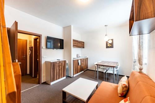Kuchyňa alebo kuchynka v ubytovaní Apartmany Kouty