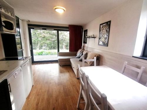 Kuchyň nebo kuchyňský kout v ubytování Le Chamroussien - Appartement 1700