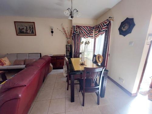 Un lugar para sentarse en 3 Residence Cape View