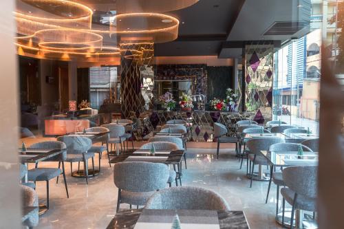Restorāns vai citas vietas, kur ieturēt maltīti, naktsmītnē Amethyst Hotel Pattaya