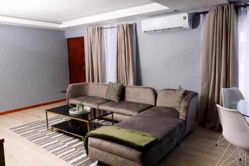 Posezení v ubytování Uptown Apartments - Casalinga Villas