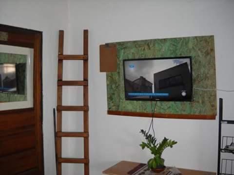 Μια τηλεόραση ή/και κέντρο ψυχαγωγίας στο Casa en Solar do Unhao