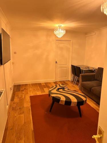 a living room with a couch and a coffee table at 2 bed Solihull near NEC Airport, JLR, Resort Wrld in Solihull