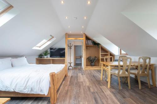 Кровать или кровати в номере Stable Lodge - Boutique Bed & Breakfast