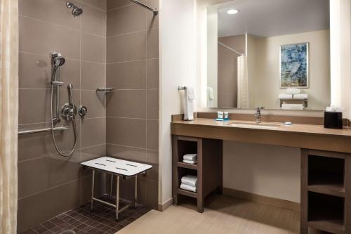 a bathroom with a sink and a shower at Hyatt House San Jose/Cupertino in Cupertino