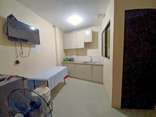 Kuchyň nebo kuchyňský kout v ubytování 2020 Travelers Inn