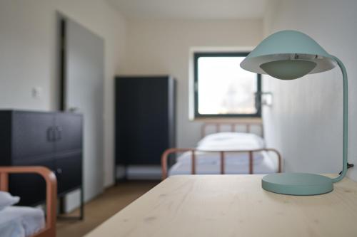Ένα ή περισσότερα κρεβάτια σε δωμάτιο στο Apartmány Velká Morava