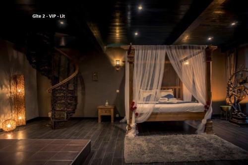 Postel nebo postele na pokoji v ubytování Suite Wellness