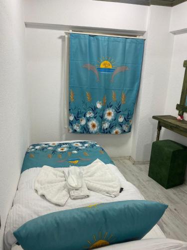 Ein Bett oder Betten in einem Zimmer der Unterkunft Scala Otel