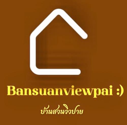 a white arrow sign on a yellow background with a word at Bansuan viewpai in Pai