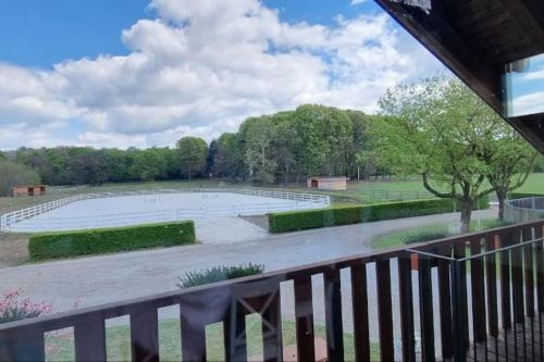 a view of a tennis court from a balcony at COUNTRY HOUSE LA MIA TERRA in Angera