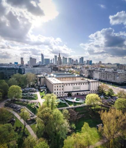 a view of a city with buildings and trees at VIEW 3 fast WiFi 1Gbs 85'TV AmazonTV HBO Disney+ in Warsaw