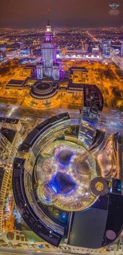 an aerial view of a city at night at VIEW 3 fast WiFi 1Gbs 85'TV AmazonTV HBO Disney+ in Warsaw
