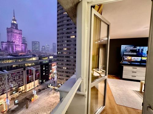 a view of a city skyline from a building at VIEW 3 fast WiFi 1Gbs 85'TV AmazonTV HBO Disney+ in Warsaw