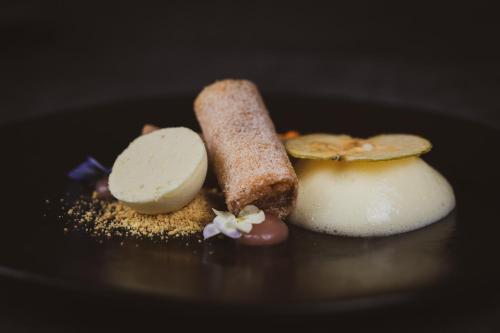 a close up of some food on a plate at Briery Wood Hotel in Ambleside
