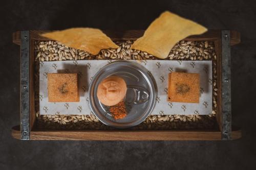 a plate with a pot of food on a table at Briery Wood Hotel in Ambleside