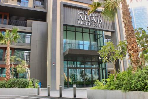 a building with a sign on the front of it at Розкішна квартира з видом на Бурж Халіфа in Dubai