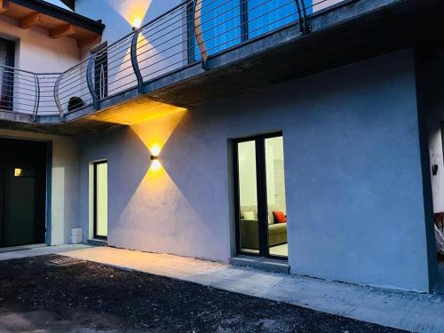a house with a staircase on the side of it at Casa Feby in Aosta