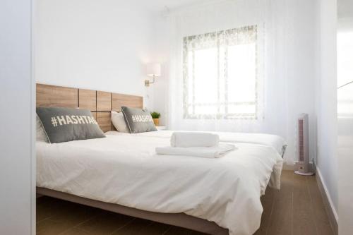 Postel nebo postele na pokoji v ubytování HH Apartamento La Herradura Playa