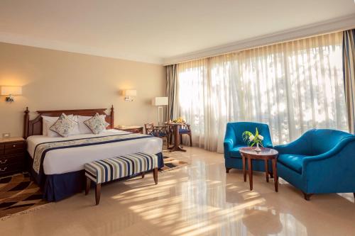 Ein Bett oder Betten in einem Zimmer der Unterkunft Stella Di Mare Grand Hotel