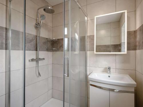a bathroom with a shower and a sink at 2 bed in Poole 85399 in Lytchett Matravers