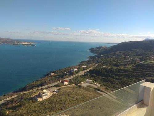a view of the ocean from a house at PALACE Sea view in Megála Khoráfia