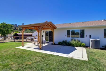 a gazebo in the yard of a house at New Listing Country Property Pet Friendly W&D in Loomis