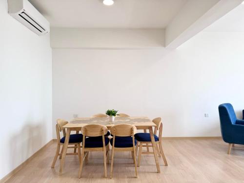 a dining room with a table and chairs at Mutiara Melaka Beach Resort by ISRA in Tangga Batu