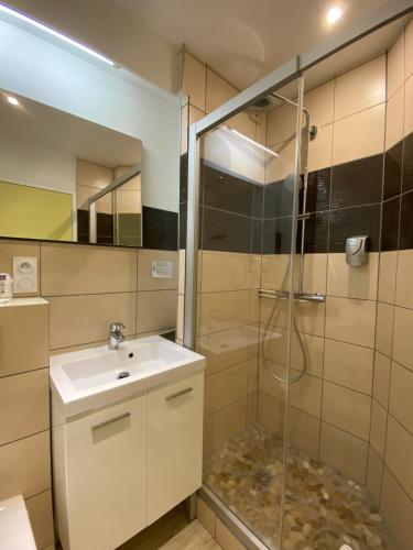 Koupelna v ubytování Hôtel Mélodie