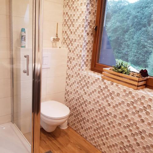 Ένα μπάνιο στο Apartamenty Magiczny Kącik